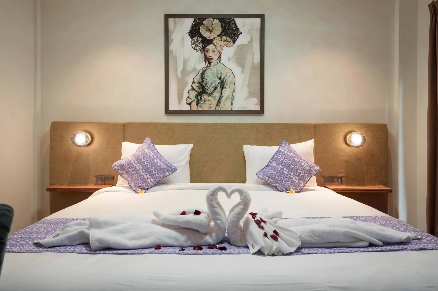 Modern wooden kitchen with stainless steel sink, refrigerator, microwave, cooktop, and warm LED lighting. - Bali Villas