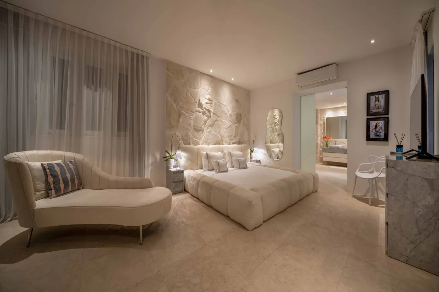 Modern home gym featuring a treadmill, weight bench, pull-up bars, exercise balls, and pink "Lifting" neon sign in a mirrored room. - Bali Villas