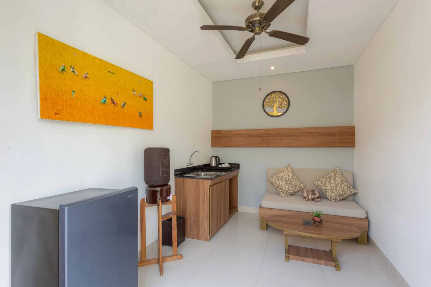 Luxurious tropical bedroom with king bed and sliding glass doors opening to a private plunge pool. - Bali Villas