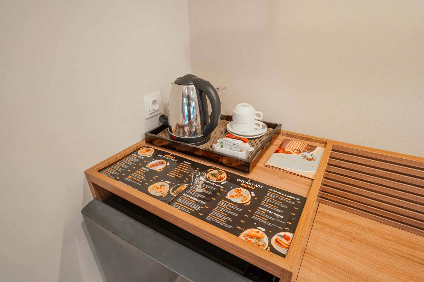 Luxurious Bali pool villa with private plunge pool, red bean bag chairs, and open doors to a rose petal-adorned bedroom. - Bali Villas